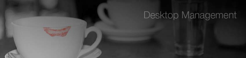 Black and white image of a tea cup on a table with the pink lipstick mark enhanced, used on the product packaging.